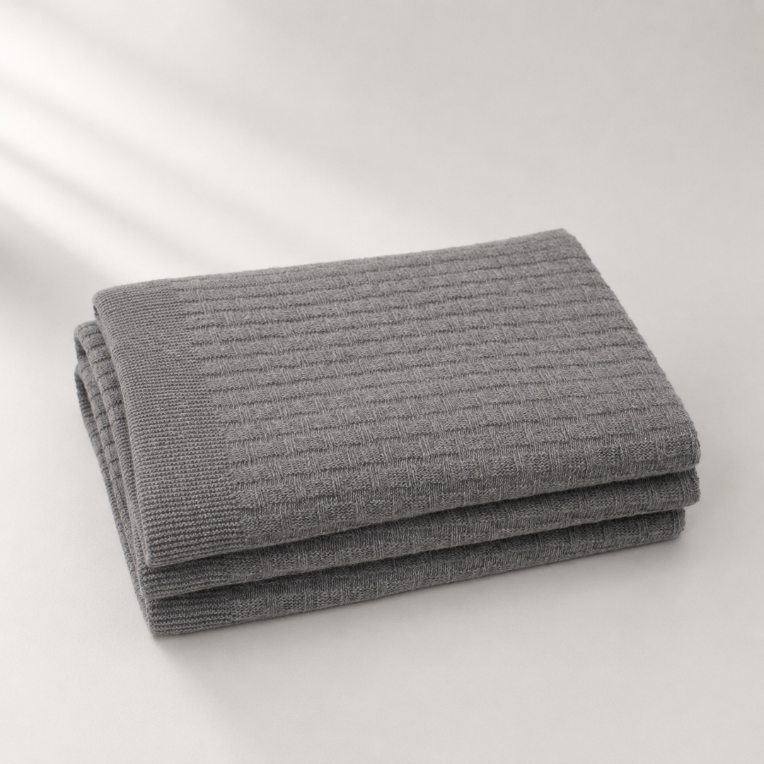 Coperta in maglia con lavorazione a mattoncini colore grigio