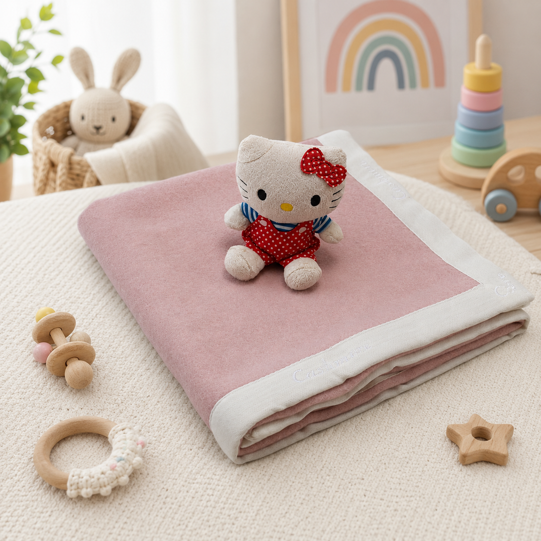 Copertina molto leggera di colore rosa cashmere e lana