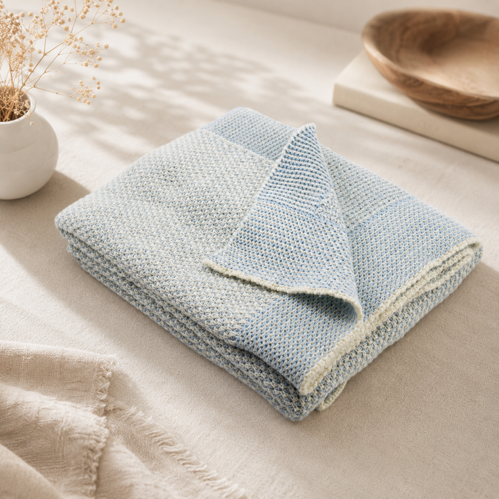 Plaid di maglia colore azzurro di lana e cashmere