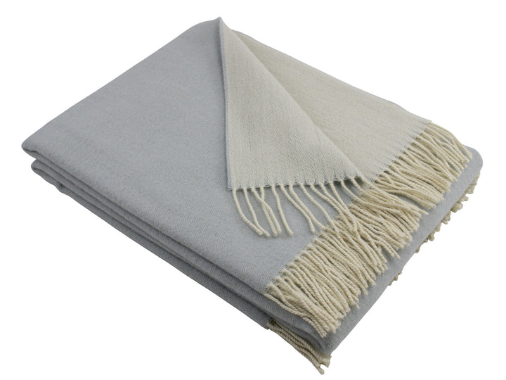 Plaid azzurro e greggio con frange