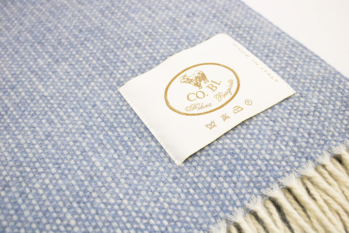 Particolare plaid di lana merino e cashmere azzurro