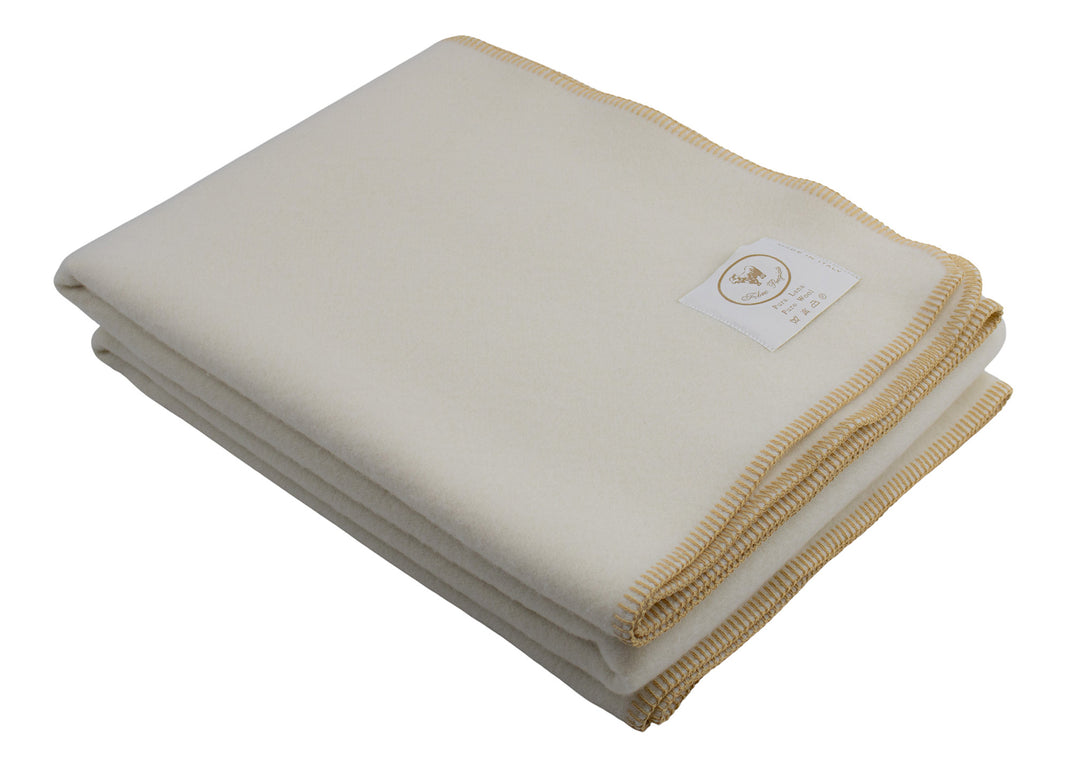 Plaid di lana bianco con bordo senape