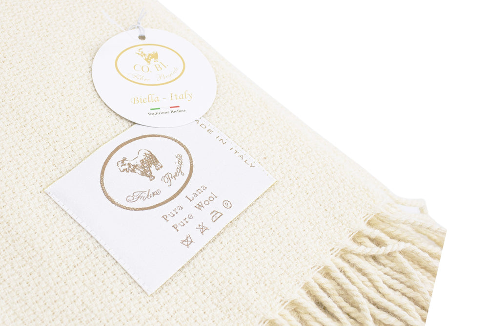 Plaid di pura lana colore bianco con lavorazione a rombi