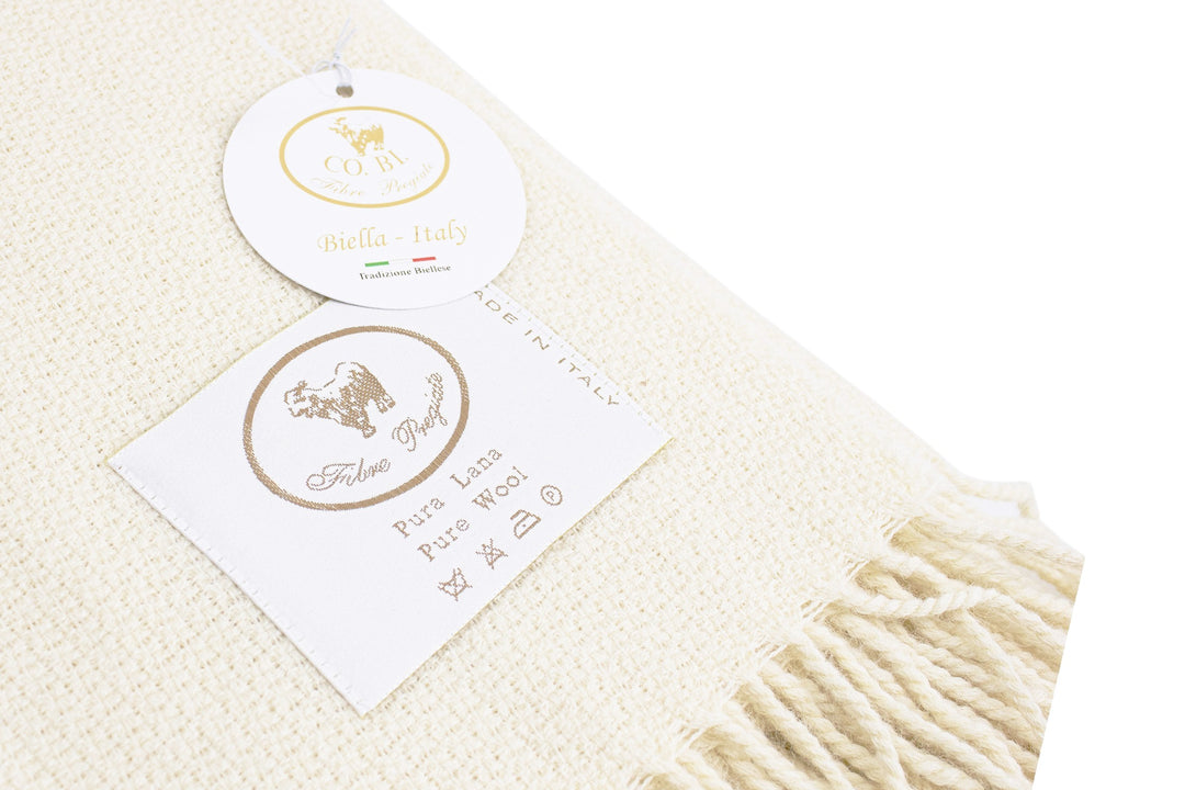 Plaid di pura lana colore bianco con lavorazione a rombi