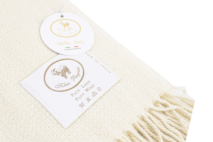 Plaid di pura lana colore bianco con lavorazione a rombi