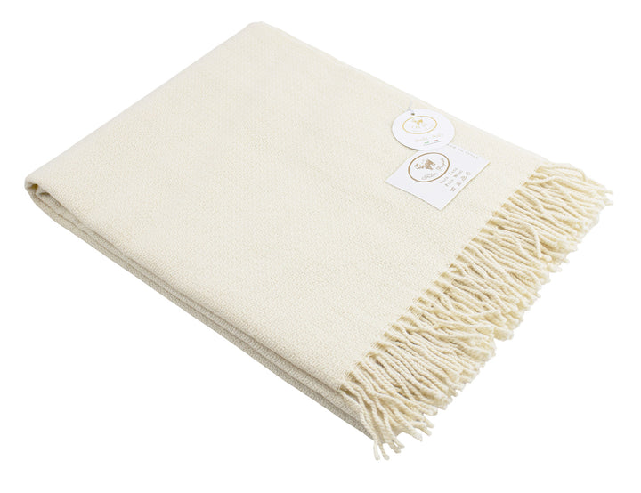 Plaid di lana bianco con piccola lavorazione