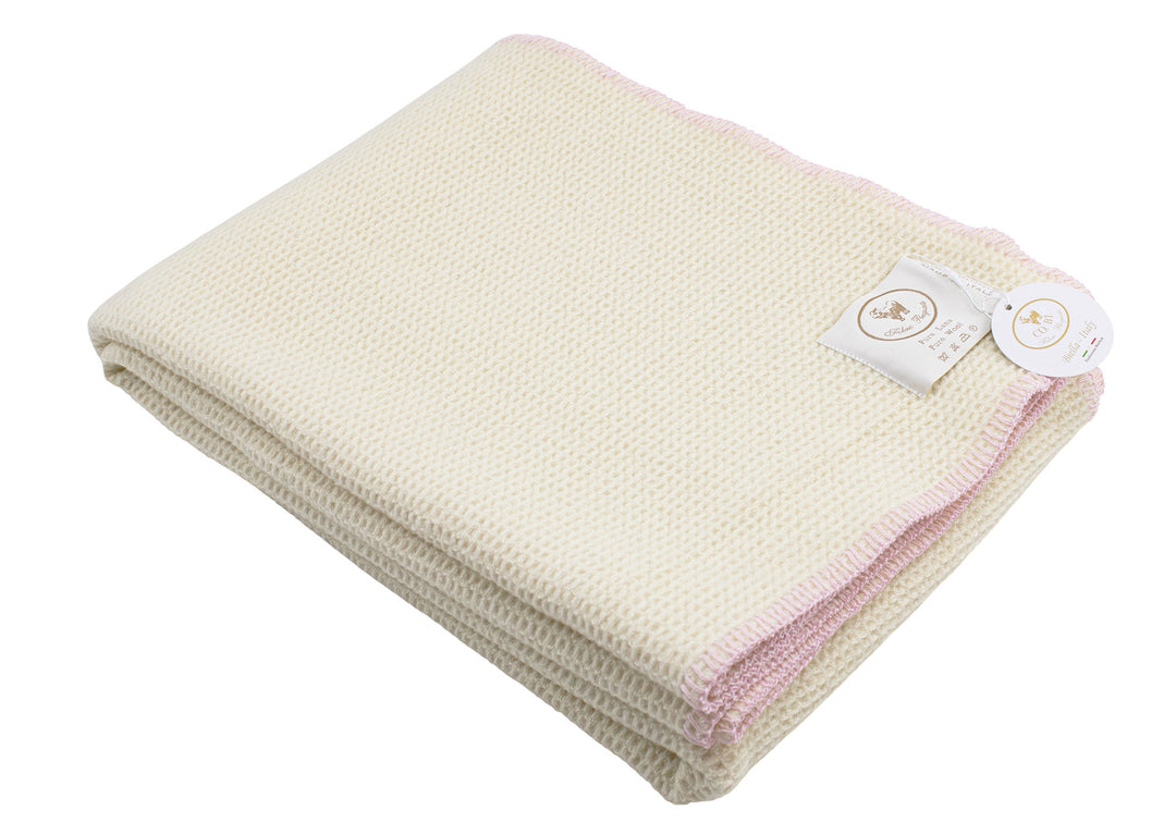 Plaid pura lana a nido d'ape con bordo rosa