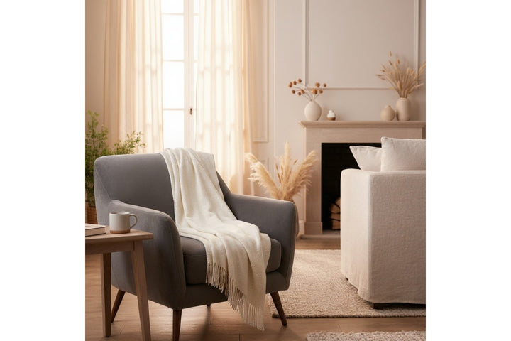 Plaid di lana bianco con frange