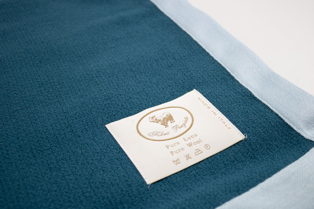 Etichetta coperta di lana color petrolio