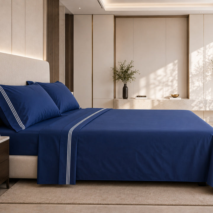 Completo letto matrimoniale blu con cordonetto bianco